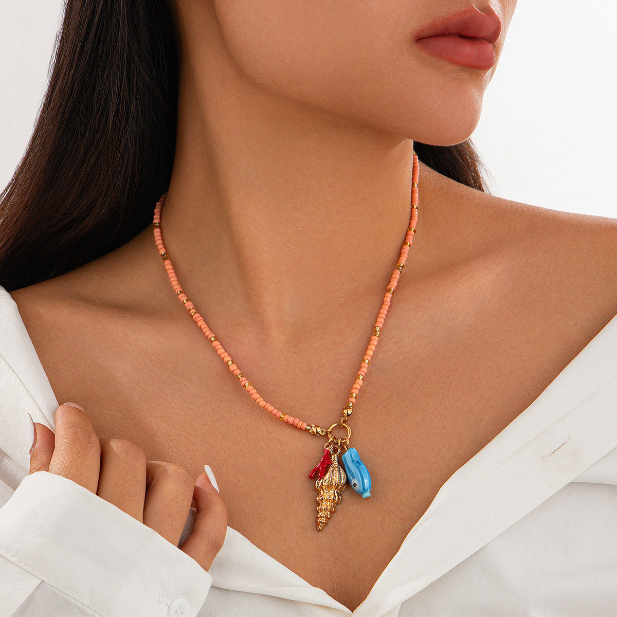 Collana Pendente Mano di Buddha e Conchiglia