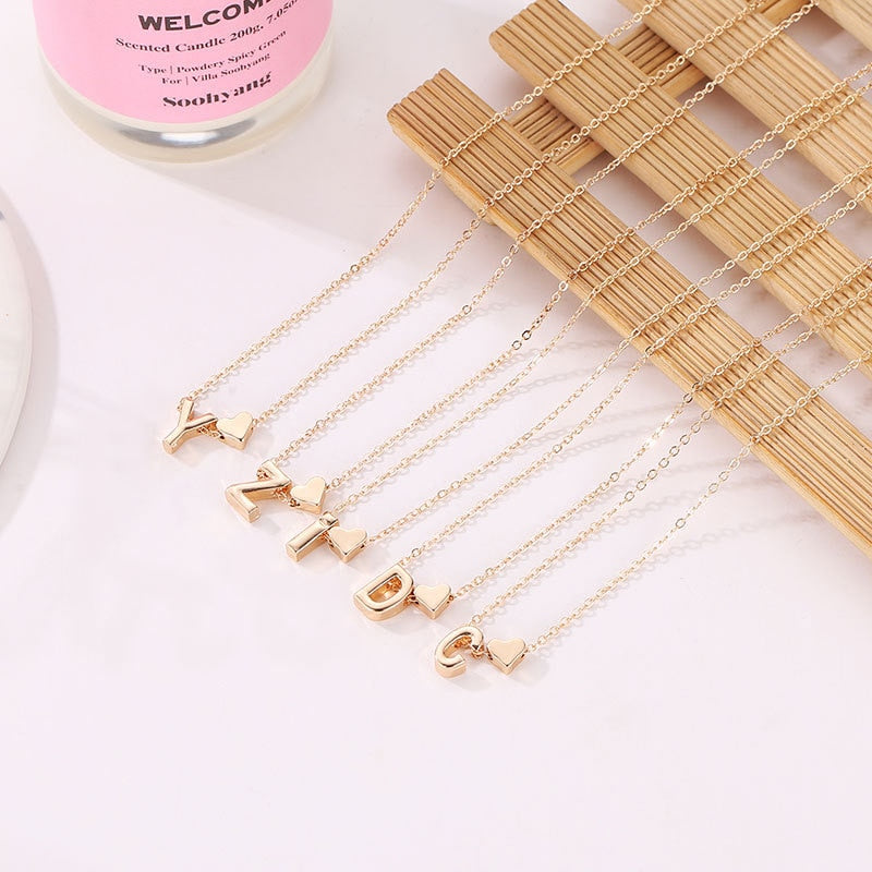 Tiny Heart Initial Necklace - Dolcezza Minimalista con un Tocco Personale