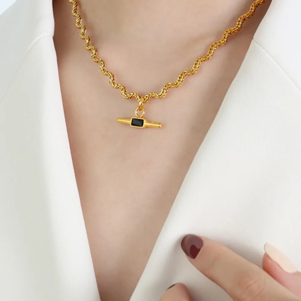 Collana Pendente Conico in Vetro e Acciaio Titanio