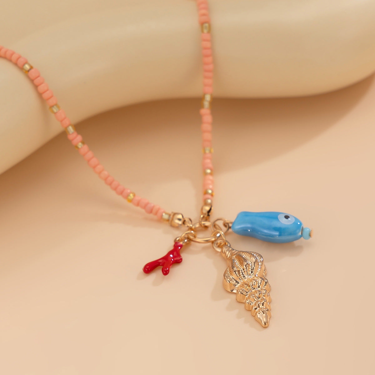 Collana Pendente Mano di Buddha e Conchiglia
