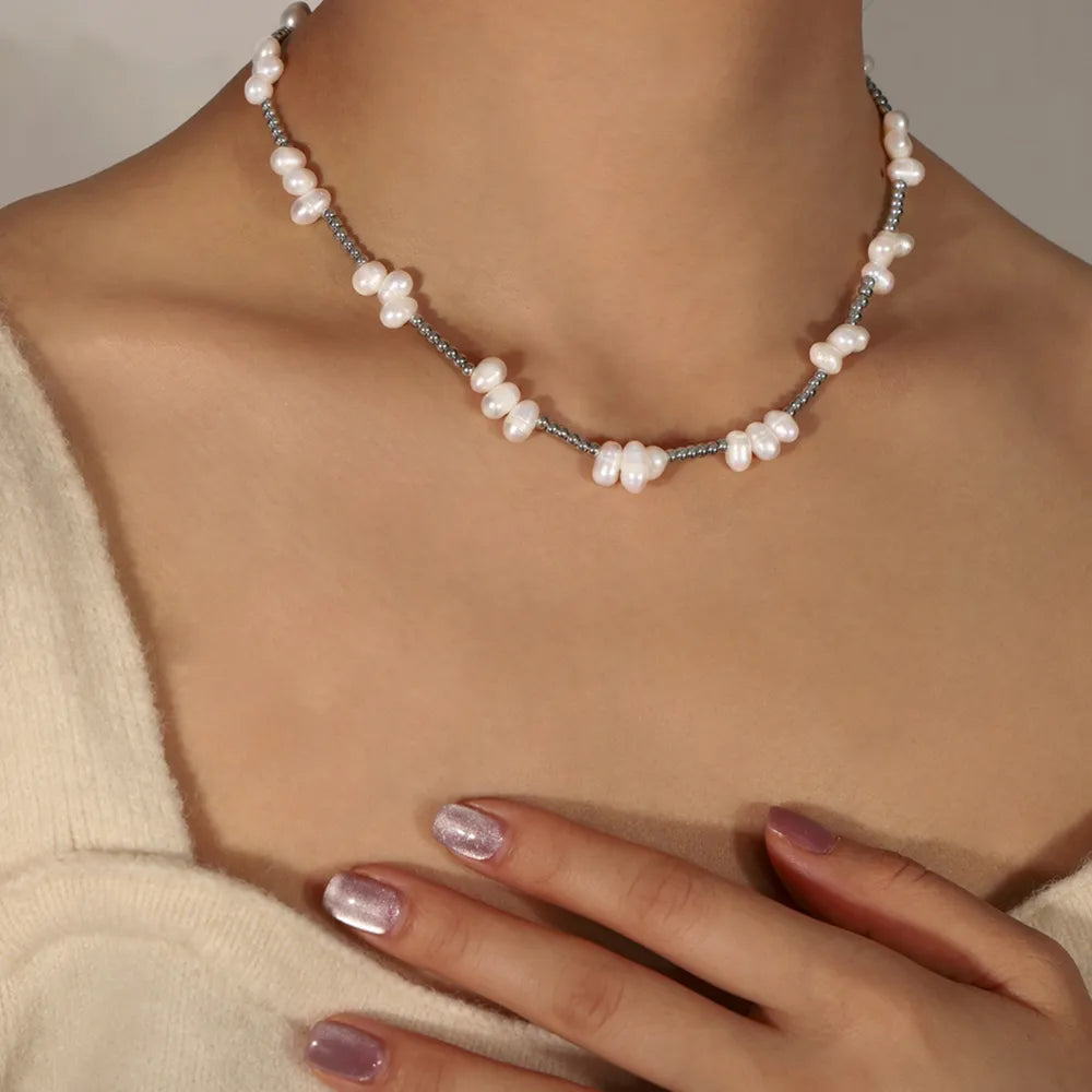 Collana con Perle d’Acqua Dolce e Acciaio Titanio