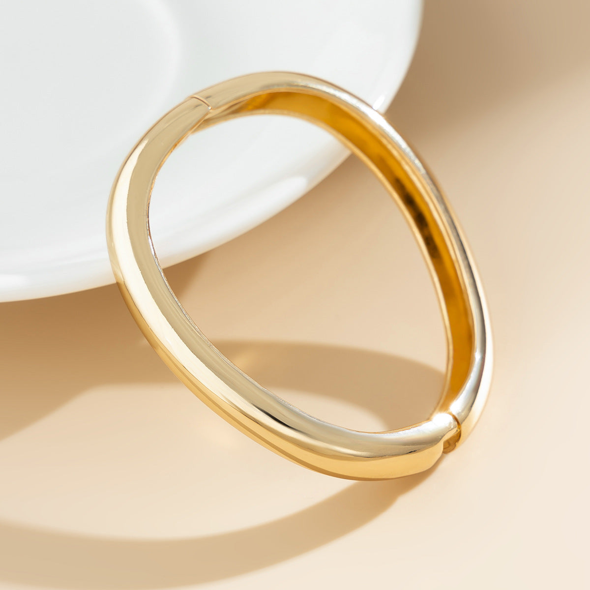 Bracciale a Goccia Specchiato – Geometria Avanguardista