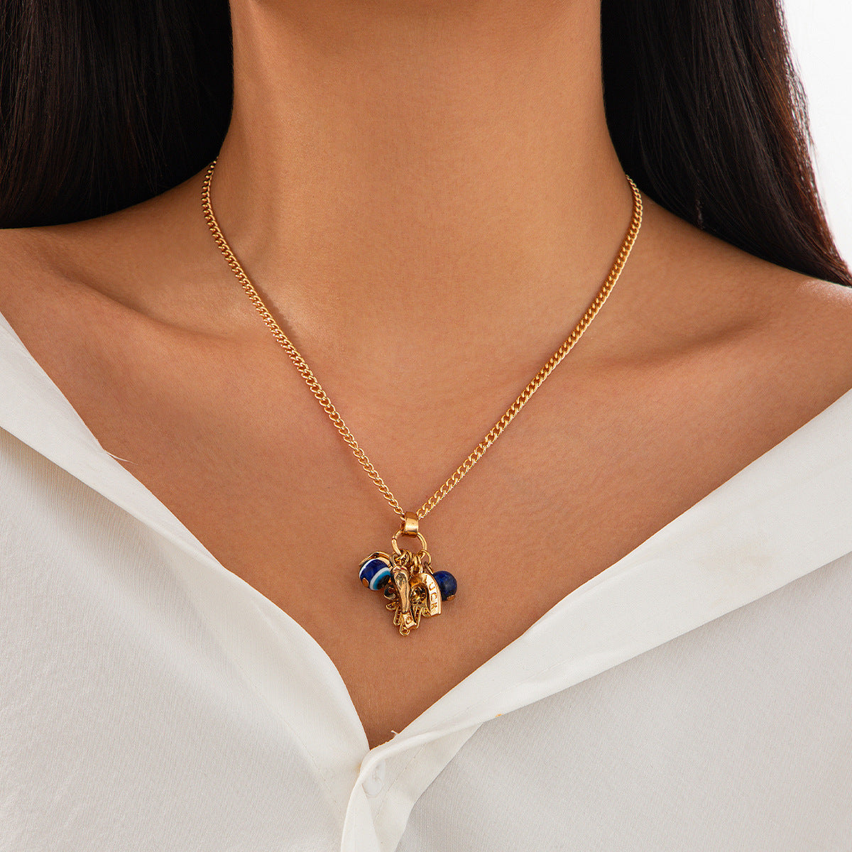 Collana Pendente Mano di Buddha e Conchiglia