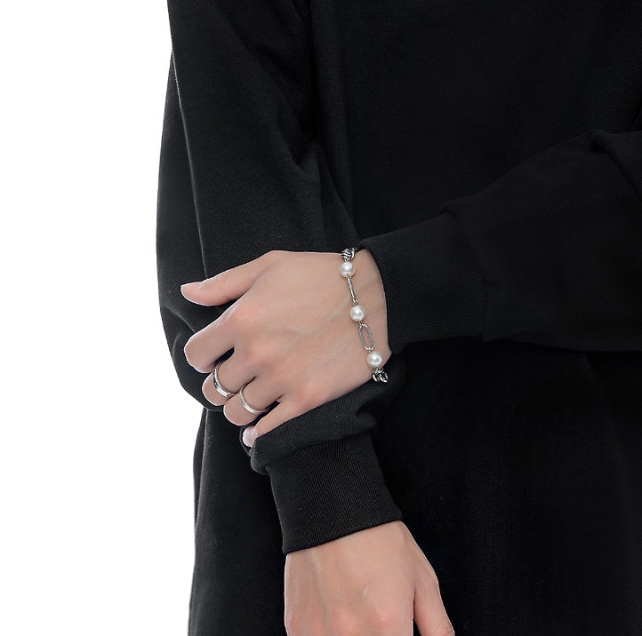 Eleganza Fusion: Il Bracciale Pearl Spliced Cuban