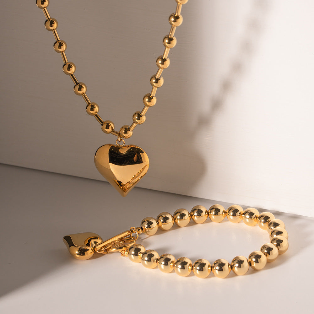 Collana Cuore Pesca: Eleganza e Significato in un Gioiello