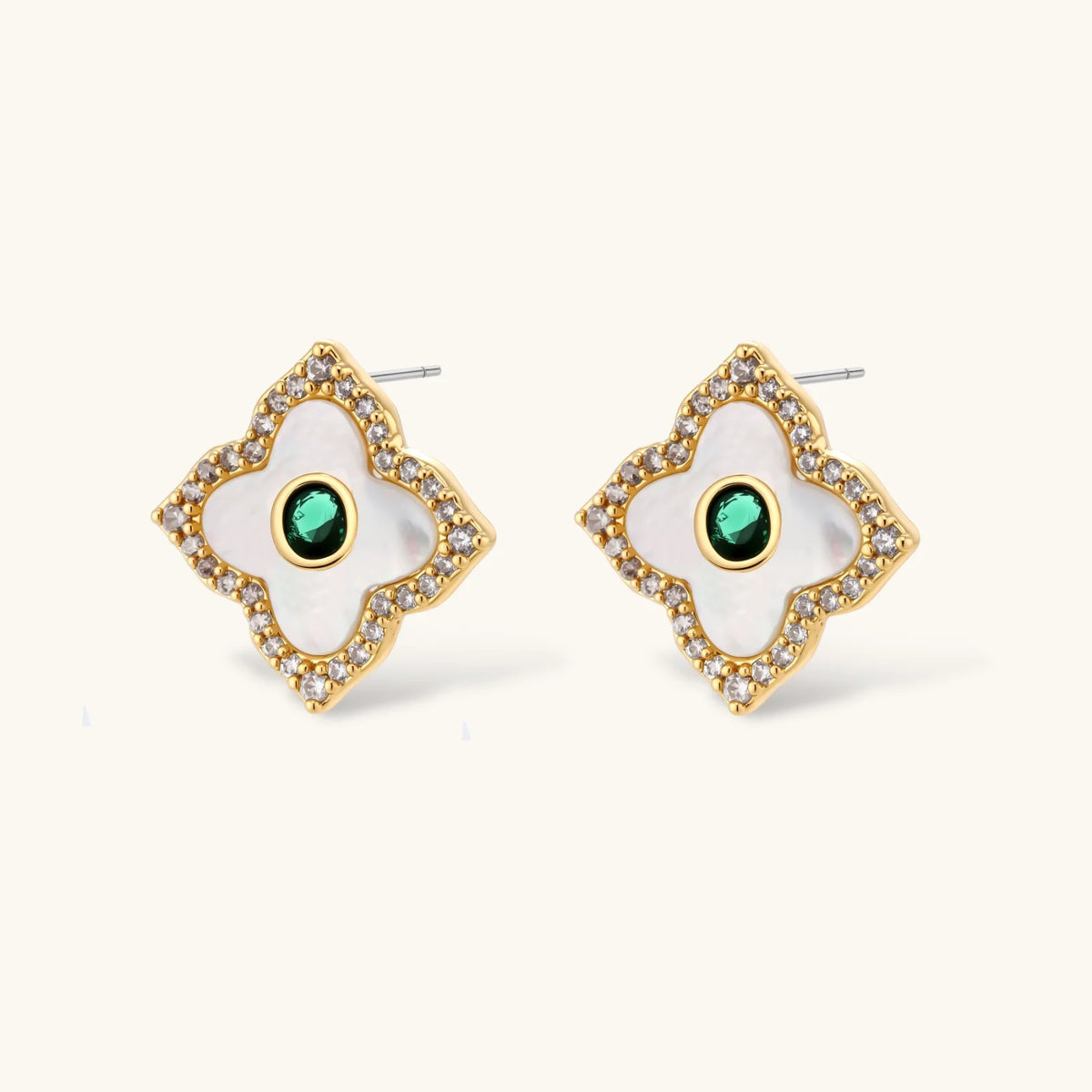 Gold-plated jewelry set with diamond-shaped pendants featuring white centers, green stones, and sparkling zirconia borders