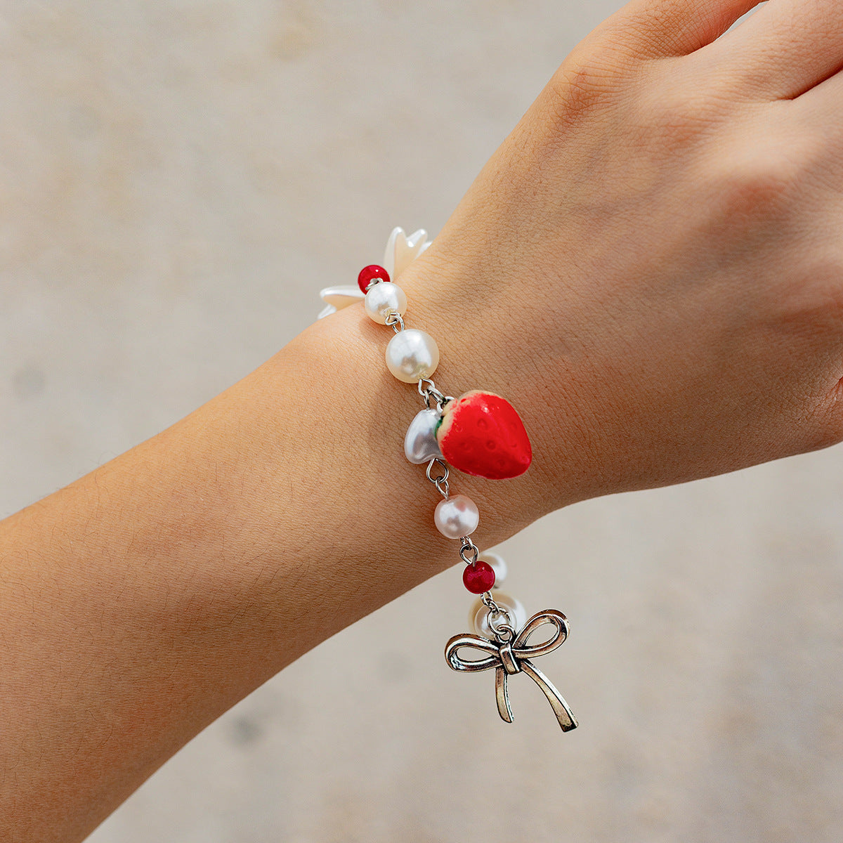 Bracciale Fragola e Fiocco con Perle