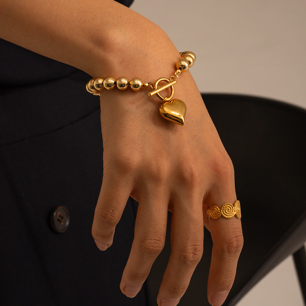 Collana Cuore Pesca: Eleganza e Significato in un Gioiello
