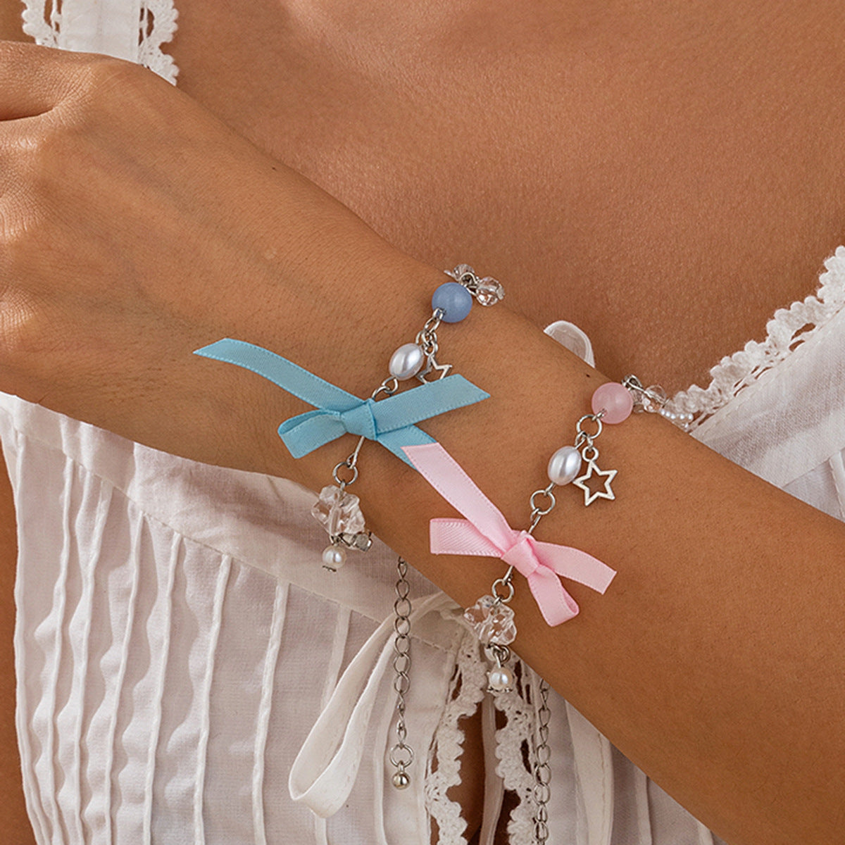 Set Bracciali Farfalla e Perle