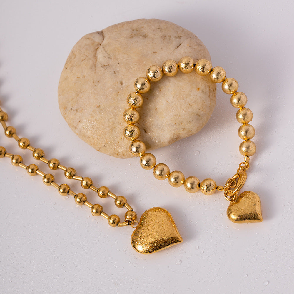 Collana Cuore Pesca: Eleganza e Significato in un Gioiello