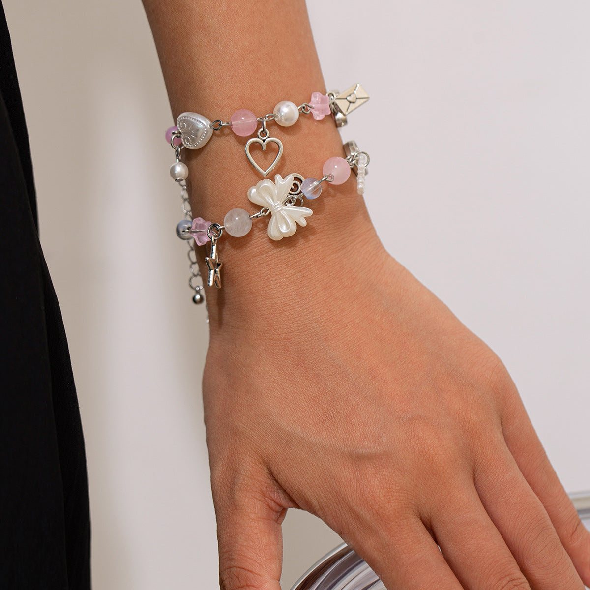 Set Bracciali Farfalla e Perle