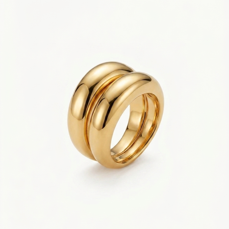 Anello "Sinfonia d'Oro": L'Armonia Perfetta tra Forza e Grazia