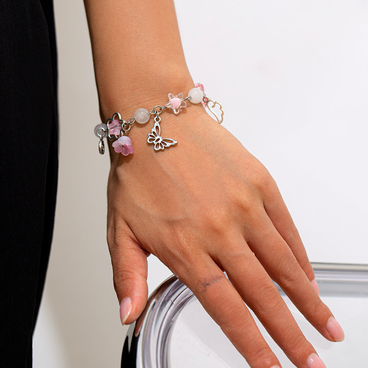 Set Bracciali Farfalla e Perle