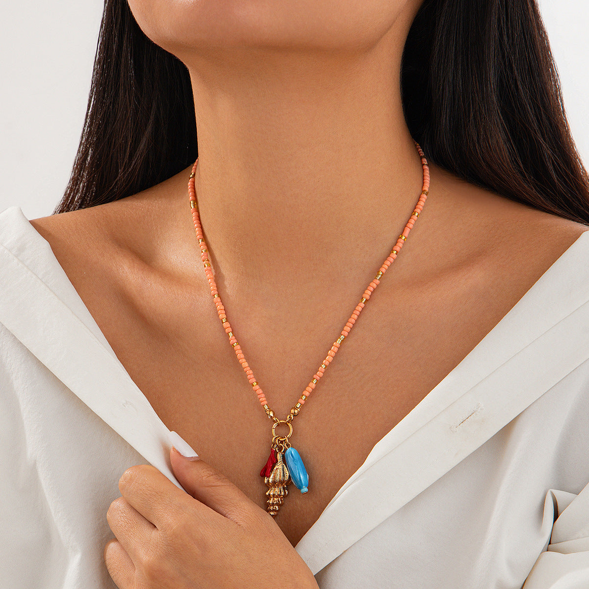 Collana Pendente Mano di Buddha e Conchiglia