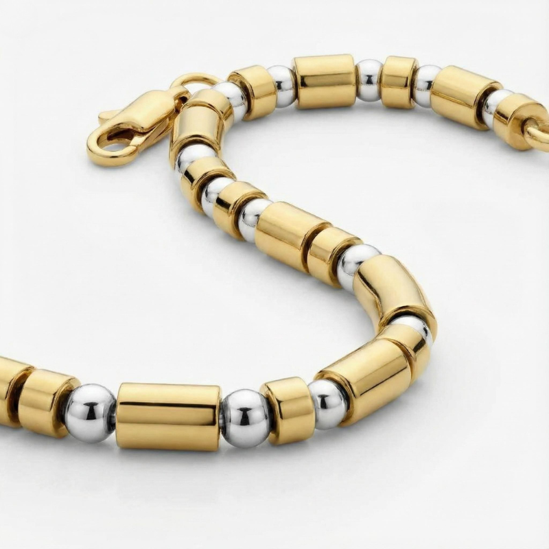 "Luce Alternata" – Bracciale Estellamare in oro e acciaio lucidato