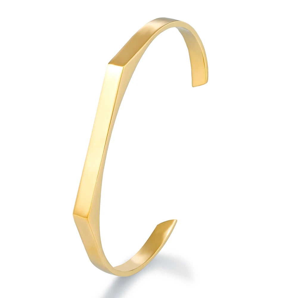 Il bracciale cuff nero che trasforma il tuo polso in un manifesto punk