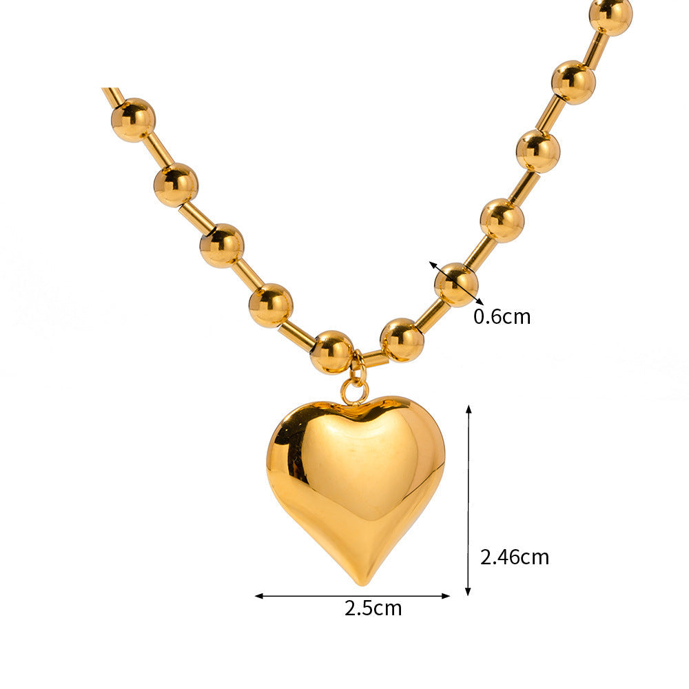 Collana Cuore Pesca: Eleganza e Significato in un Gioiello